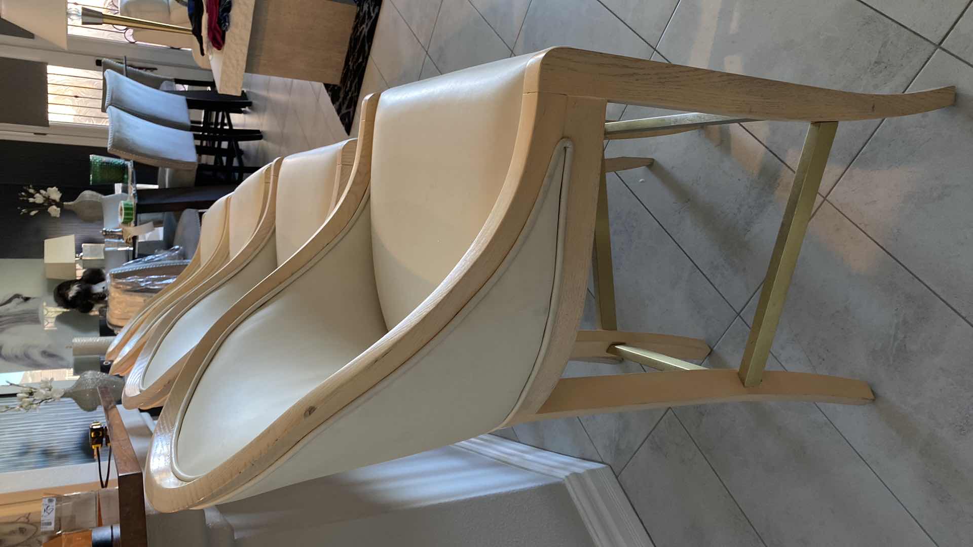 Photo 3 of 4 - CREAM COLOR LEATHER WITH LIGHT WOOD BAR STOOLS FROM THE WYNN - SEAT HEIGHT 31.5”