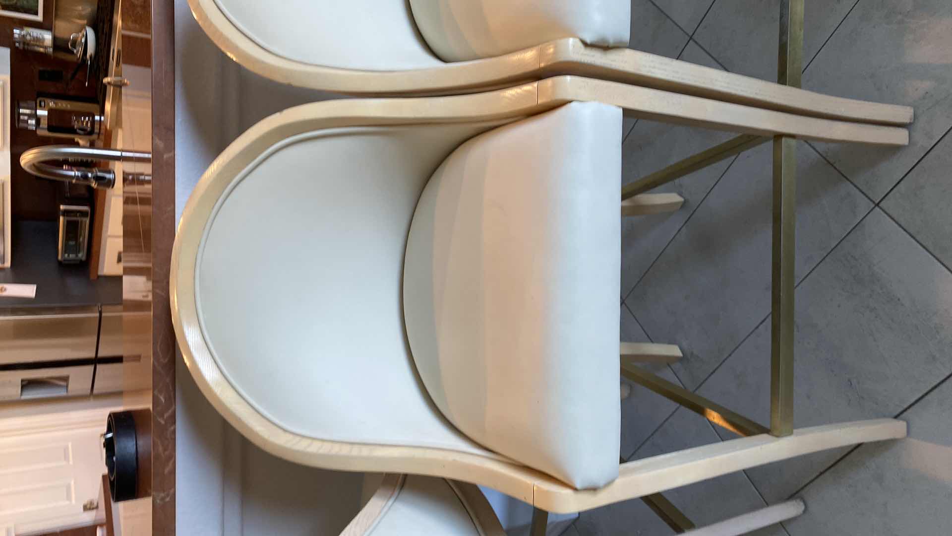 Photo 11 of 4 - CREAM COLOR LEATHER WITH LIGHT WOOD BAR STOOLS FROM THE WYNN - SEAT HEIGHT 31.5”