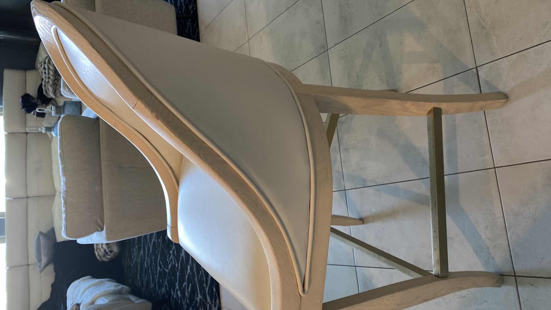 Photo 10 of 4 - CREAM COLOR LEATHER WITH LIGHT WOOD BAR STOOLS FROM THE WYNN - SEAT HEIGHT 31.5”