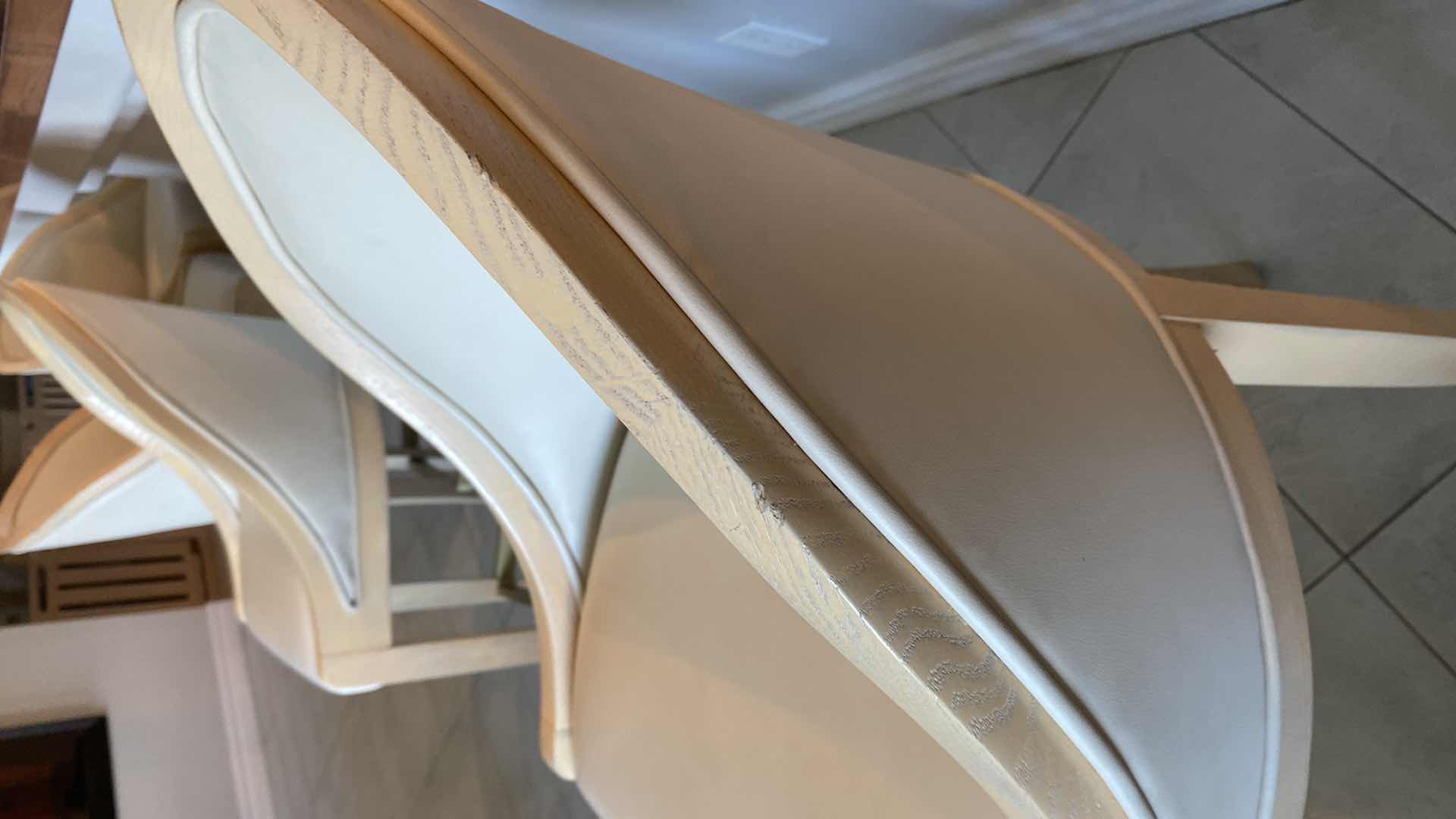 Photo 15 of 4 - CREAM COLOR LEATHER WITH LIGHT WOOD BAR STOOLS FROM THE WYNN - SEAT HEIGHT 31.5”