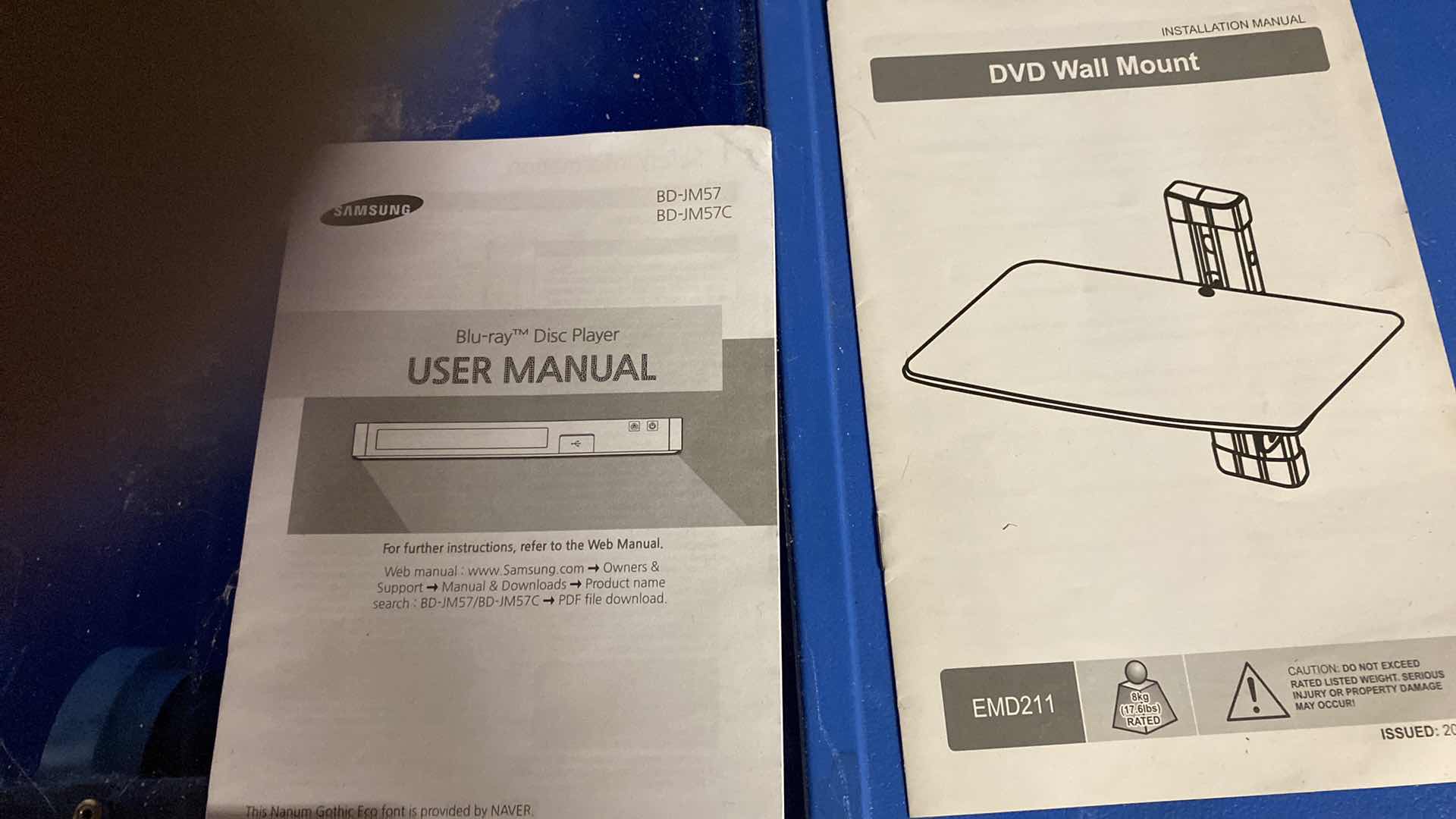 Photo 1 of SAMSUNG 60” TV WITH REMOTE AND SWIVEL WALL MOUNT, SAMSUNG DVD PLAYER. Buyer to remove from wall.