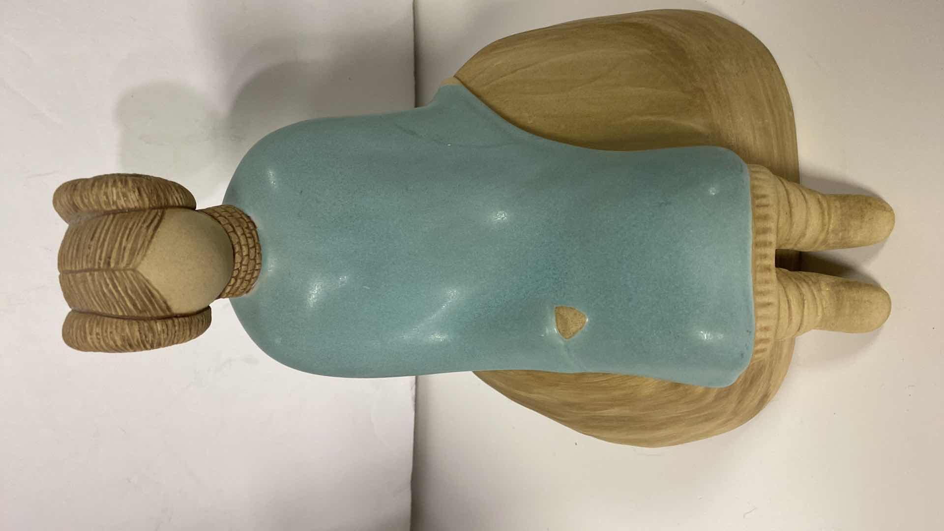 Photo 1 of JACK BLACK NAVAJO POTTERY 1989 WOMAN SEATED ON ROCK 5 1/2“ x 10“