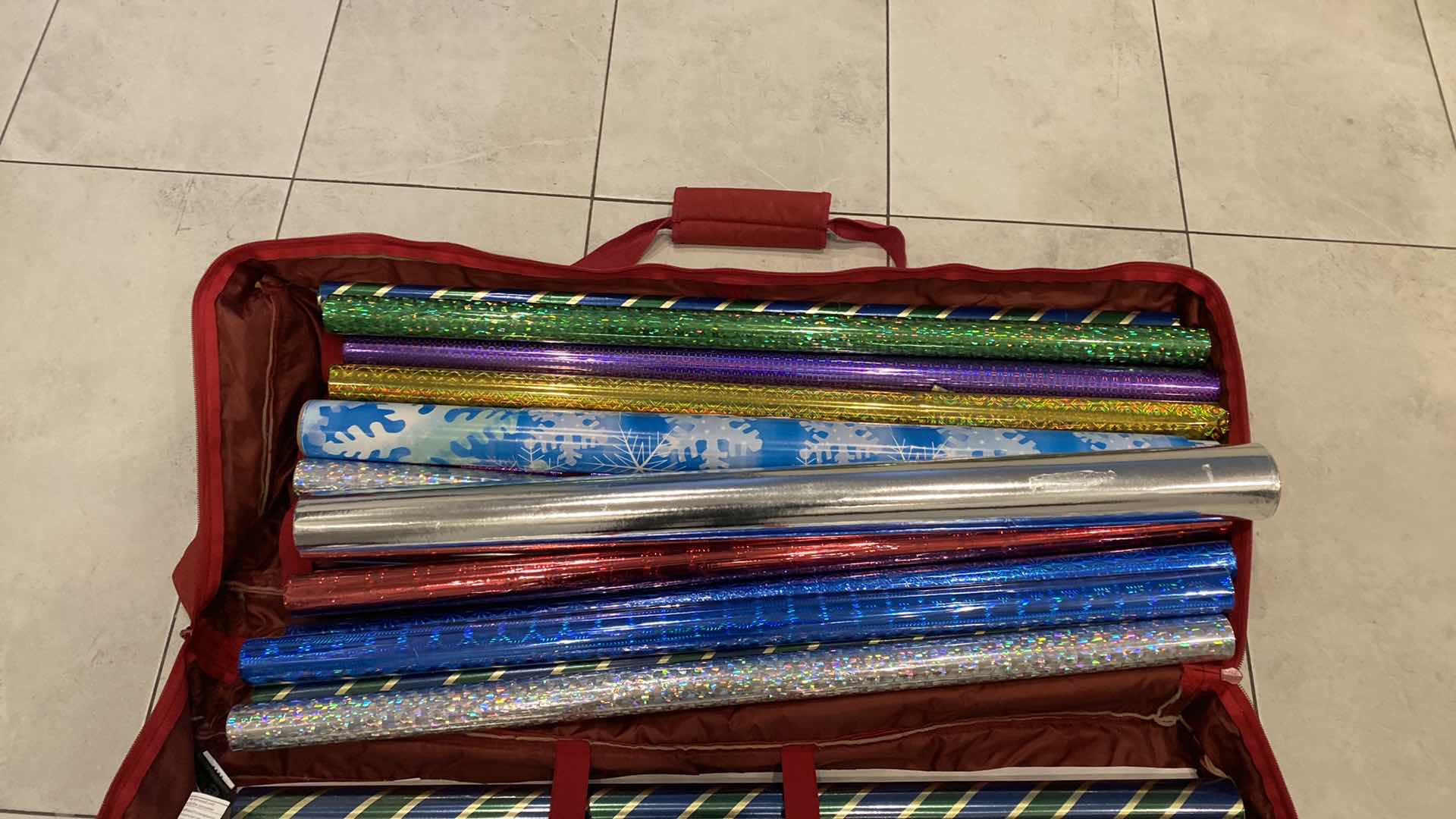 Photo 1 of NEW 20 ROLLS WRAPPING PAPER & 5 PARTIAL ROLLS INCLUDES STORAGE BAG