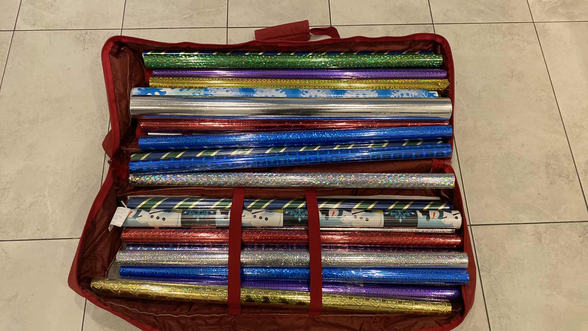 Photo 1 of NEW 20 ROLLS WRAPPING PAPER & 5 PARTIAL ROLLS INCLUDES STORAGE BAG