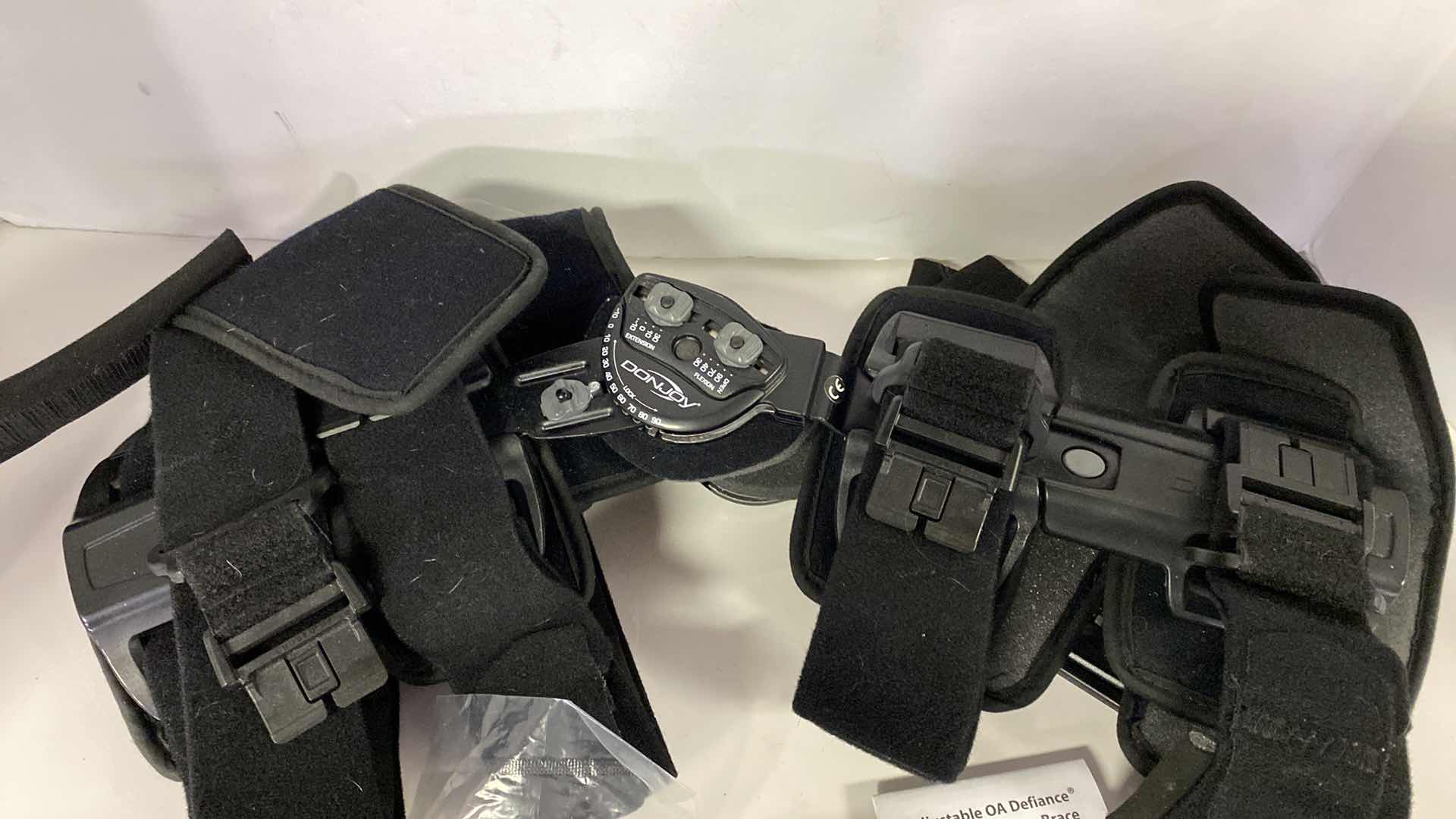 Photo 1 of DONJOY ADJUSTABLE KNEE BRACE WITH ACCESSORIES AND CARRY BAG