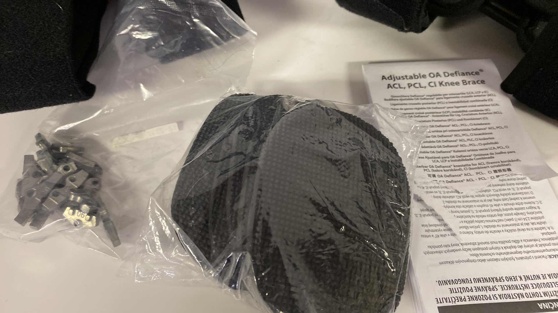 Photo 1 of DONJOY ADJUSTABLE KNEE BRACE WITH ACCESSORIES AND CARRY BAG