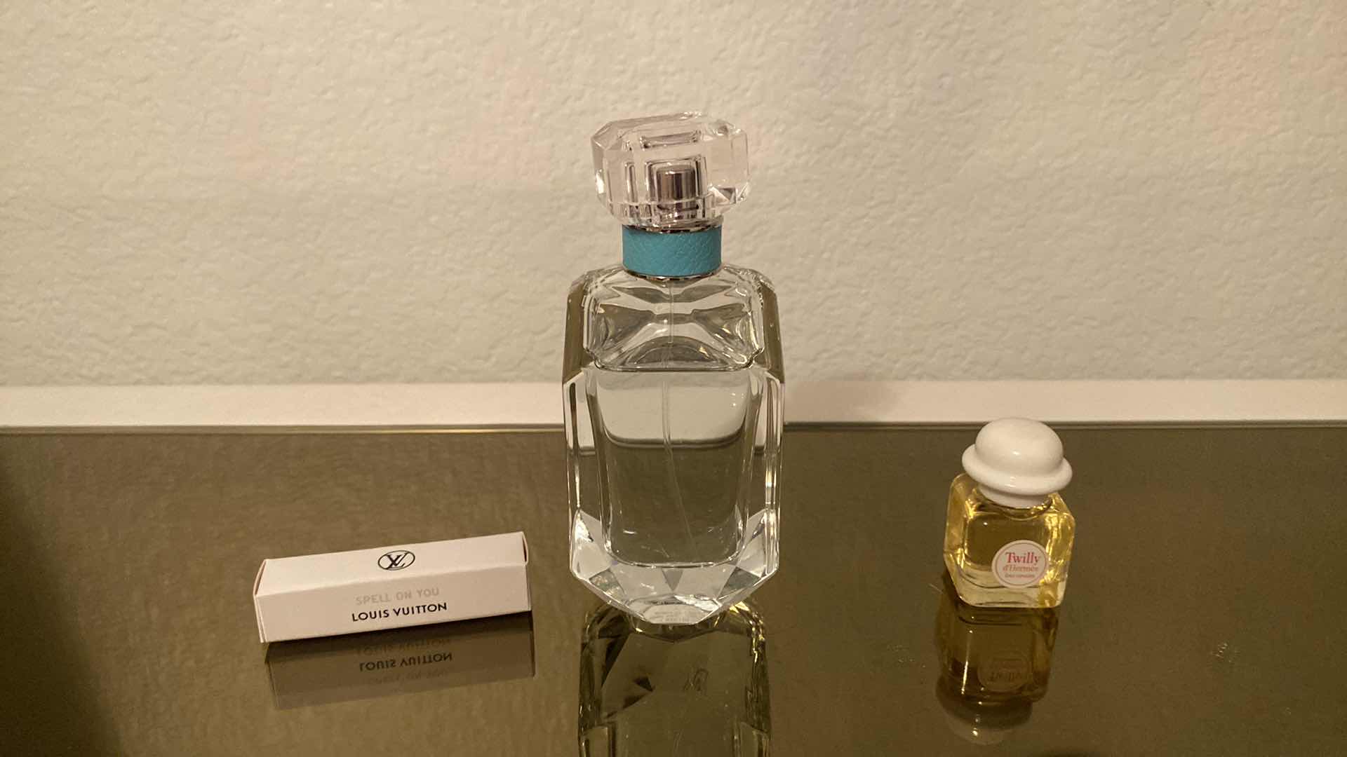 Photo 1 of TIFFANY & CO PERFUME 2.5 FL OZ. 7/8 FULL AND ASSORTED SAMPLES