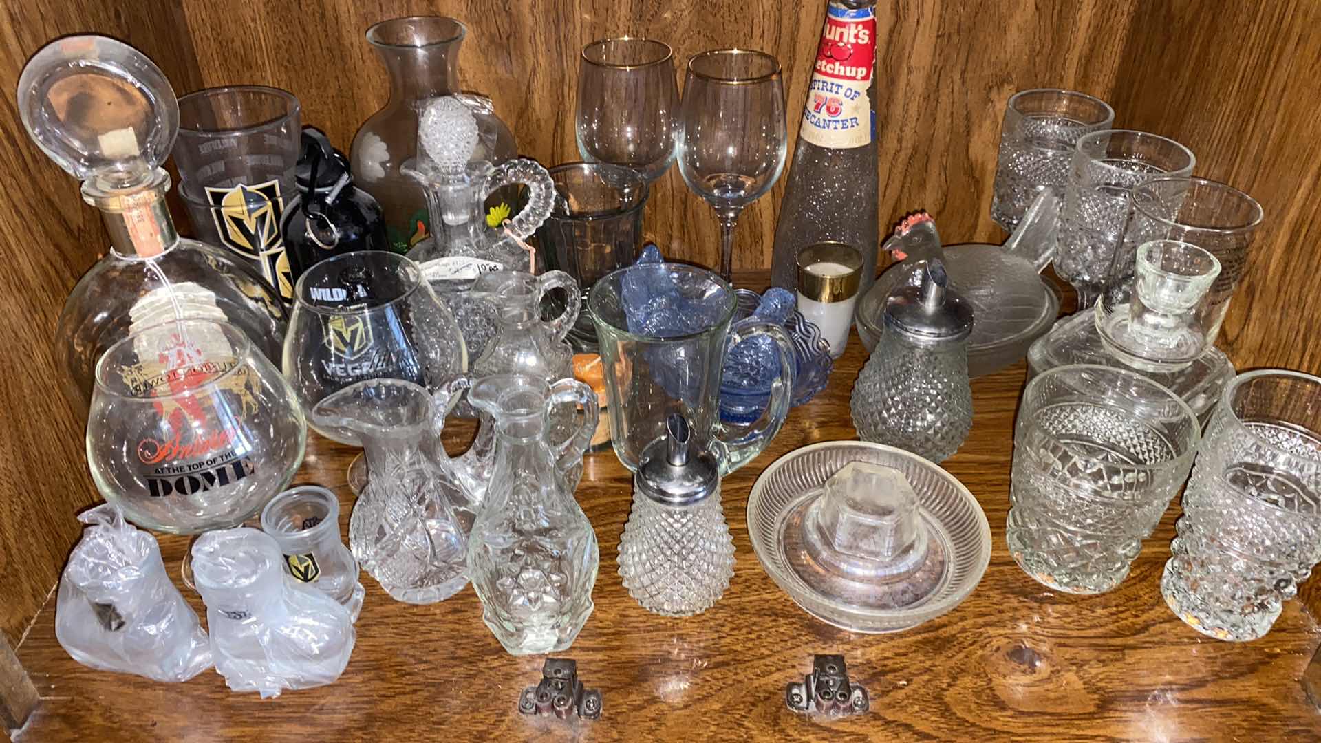 Photo 1 of SHELF OF GLASSWARE IN DINING ROOM
