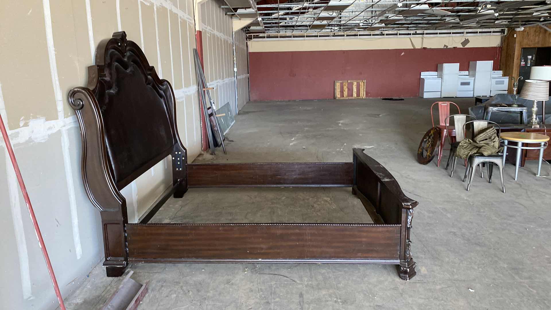 Photo 1 of CAL KING/KING TRADITIONAL WOOD AND LEATHER BED FRAME WITH ACANTHUS LEAF DESIGN BY CROWN MARK 84” X 100” H 78”