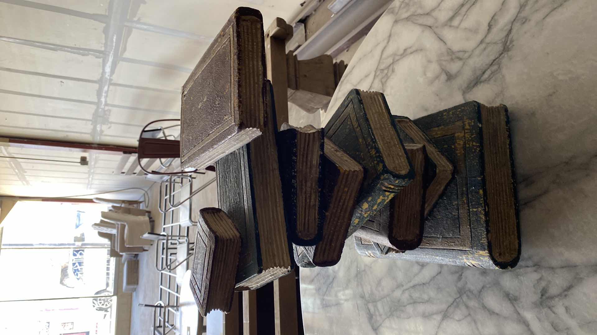 Photo 1 of HEAVY STACK OF BOOKS HOME DECOR H 17”