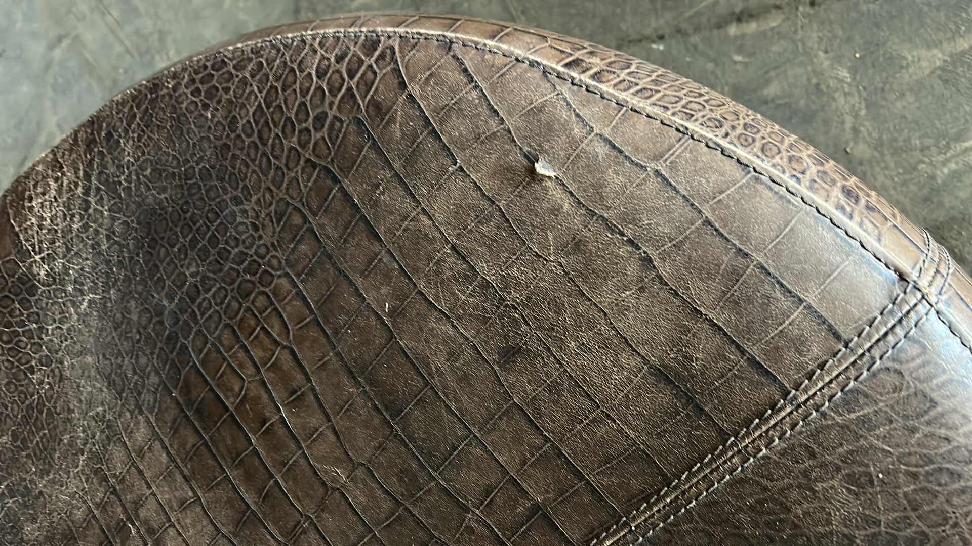 Photo 1 of ROUND LEATHER OTTOMAN 35” x 16”