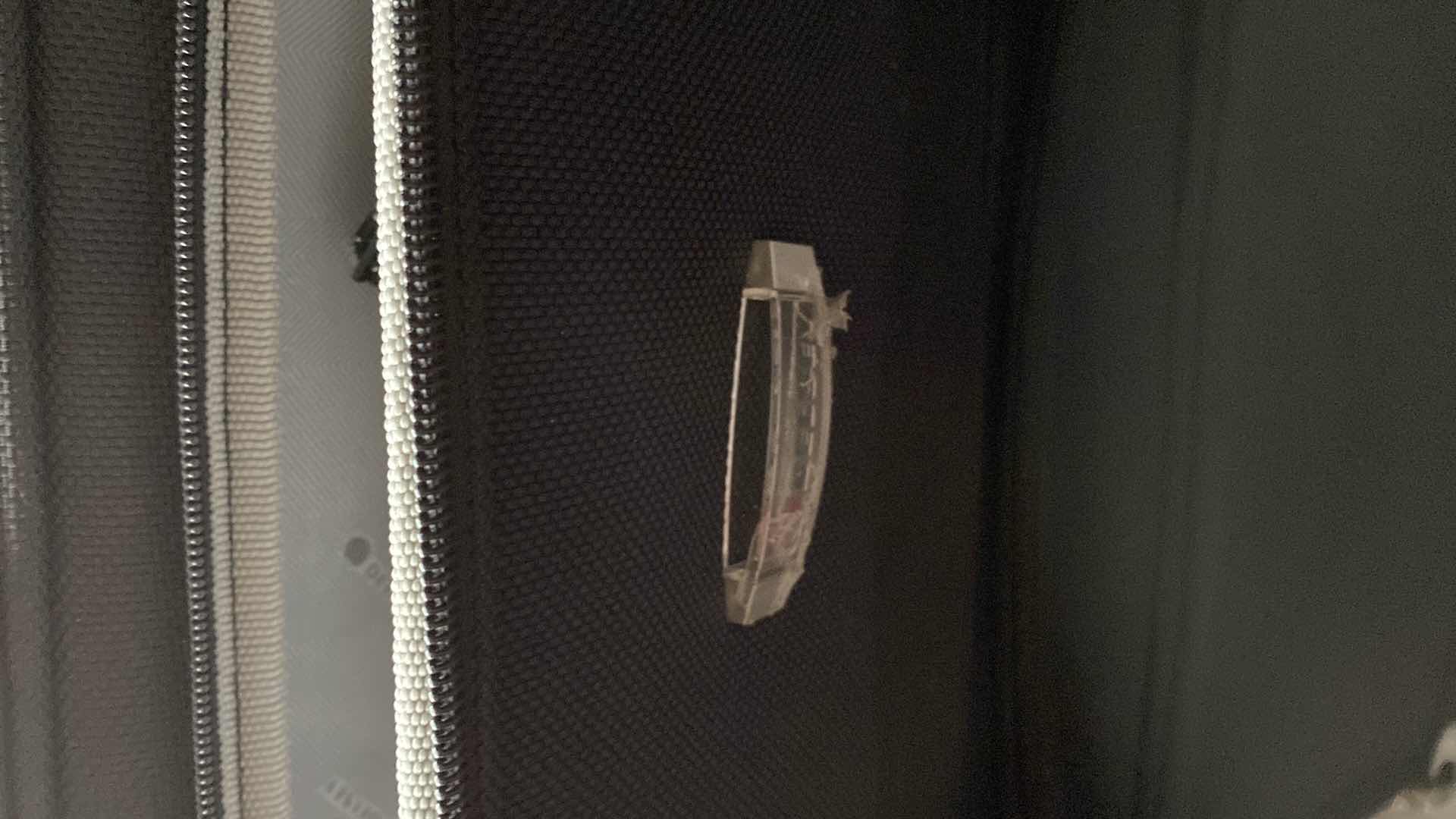 Photo 1 of 2 LARGE SUITCASES AND 1 ROLLING DUFFLE