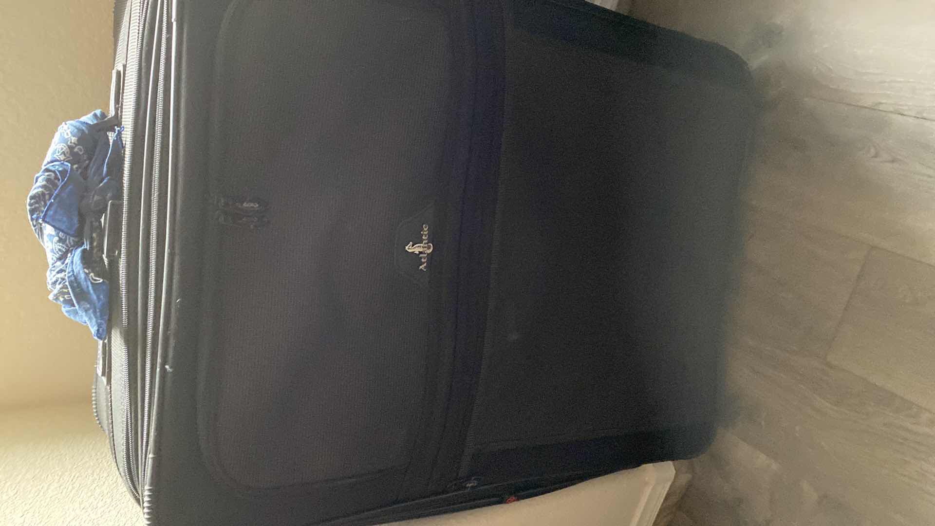 Photo 1 of 2 LARGE SUITCASES AND 1 ROLLING DUFFLE