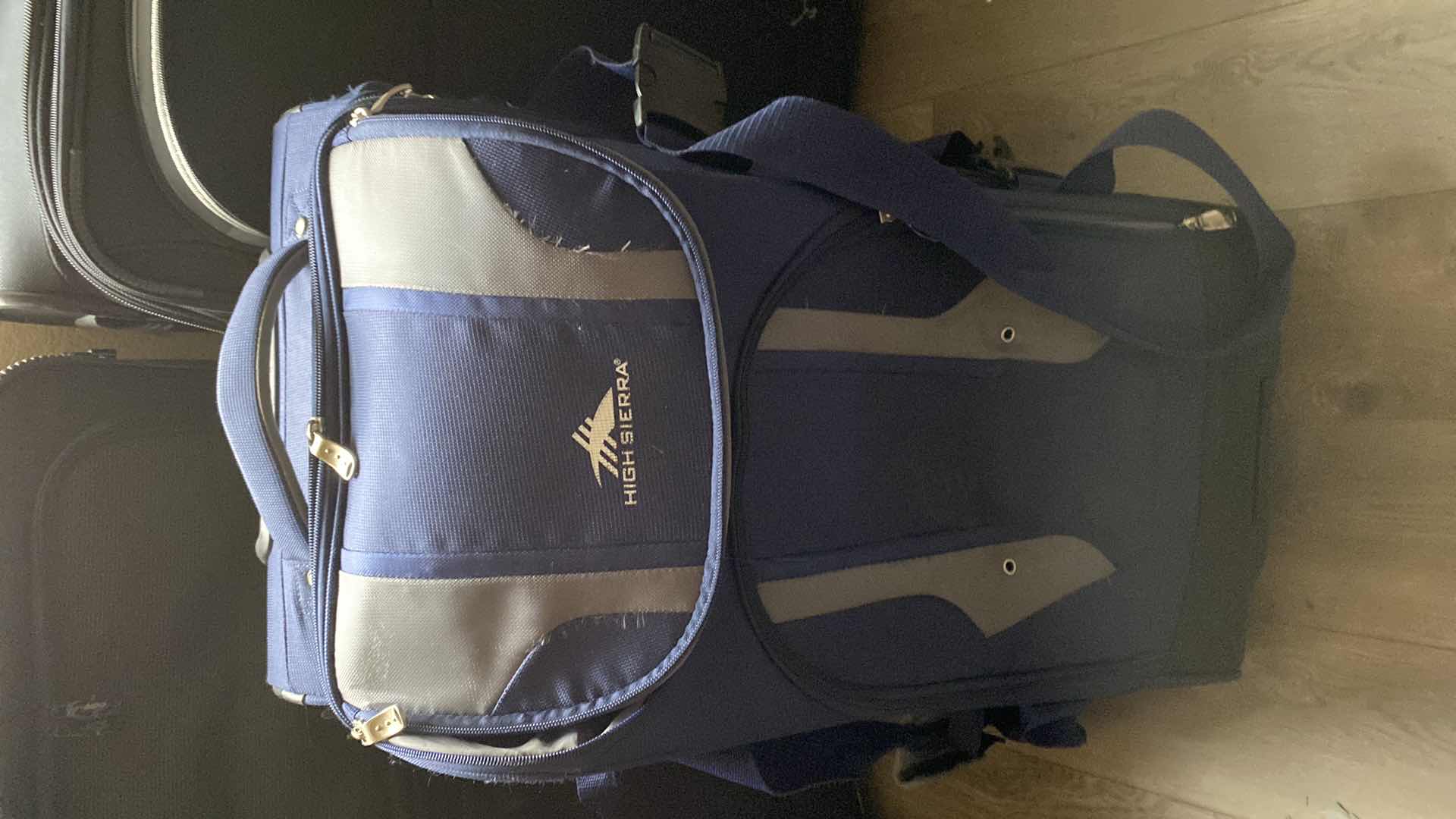 Photo 1 of 2 LARGE SUITCASES AND 1 ROLLING DUFFLE