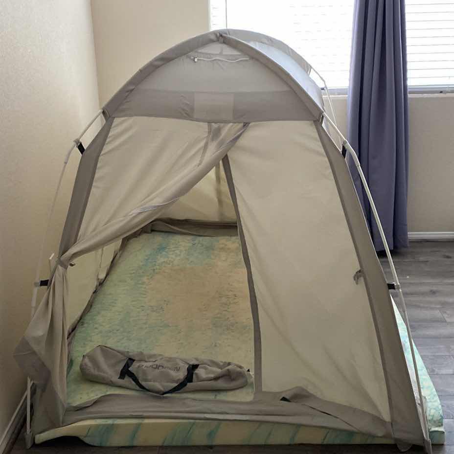 Photo 1 of IDOGEN TENT AND FOAM PAD. TENT HAS NO FLOOR