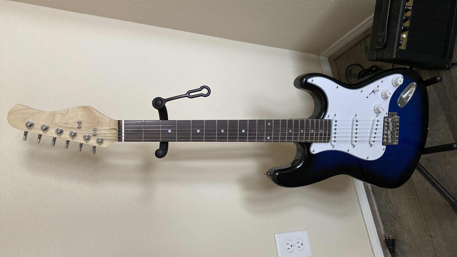 Photo 1 of 6 STRING GUITAR WITH STAND AND AMPLIFIER