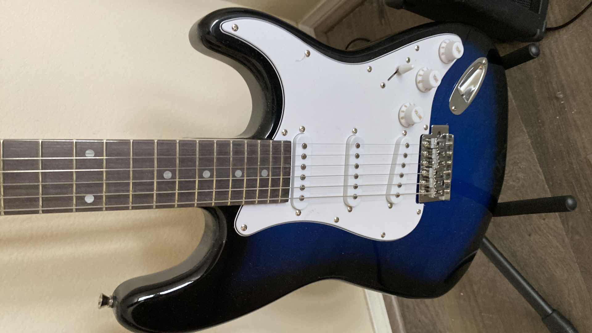 Photo 1 of 6 STRING GUITAR WITH STAND AND AMPLIFIER