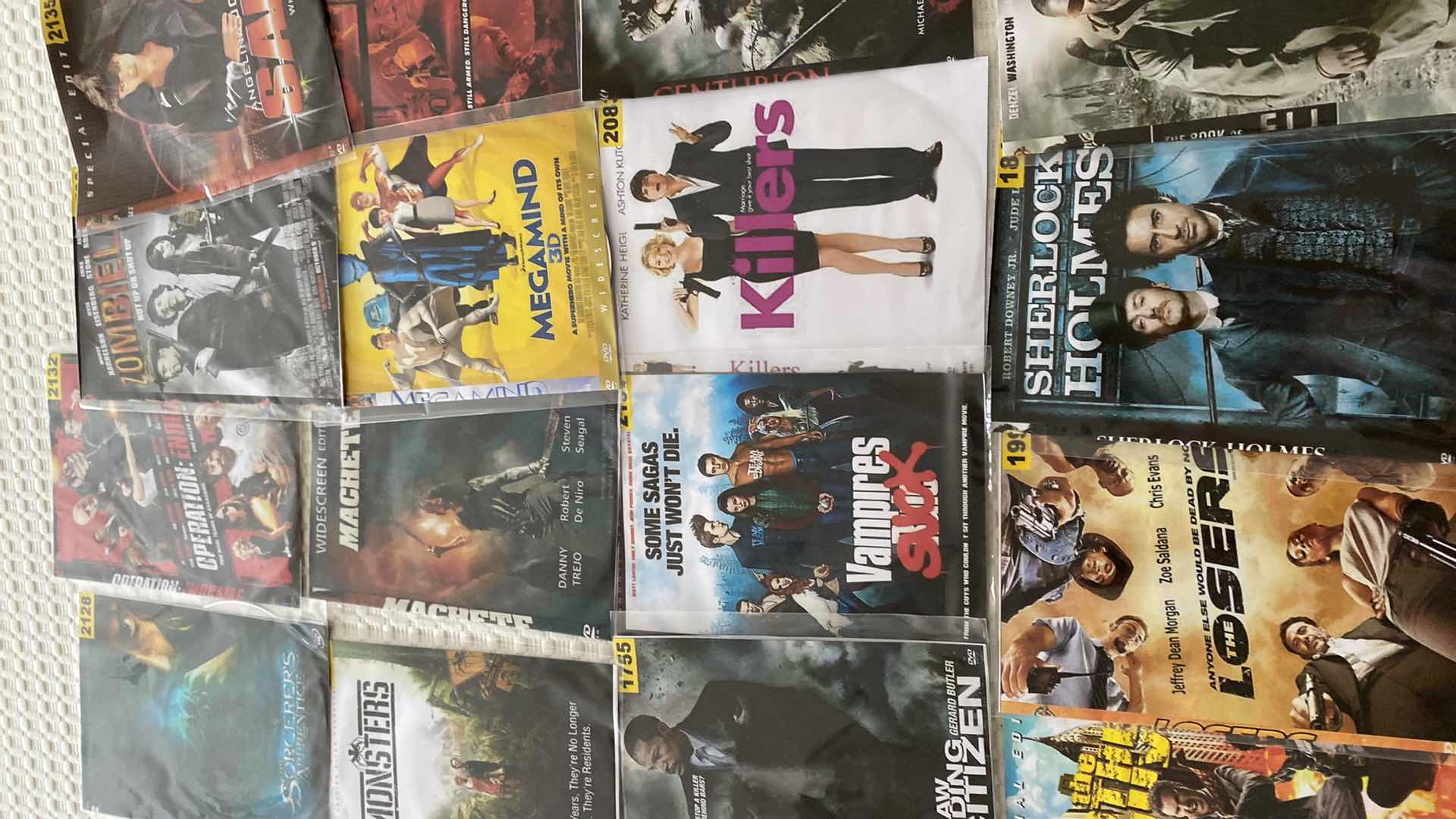 Photo 3 of ASSORTED DVDS AND SONY WALKMAN AND MISC CORDS