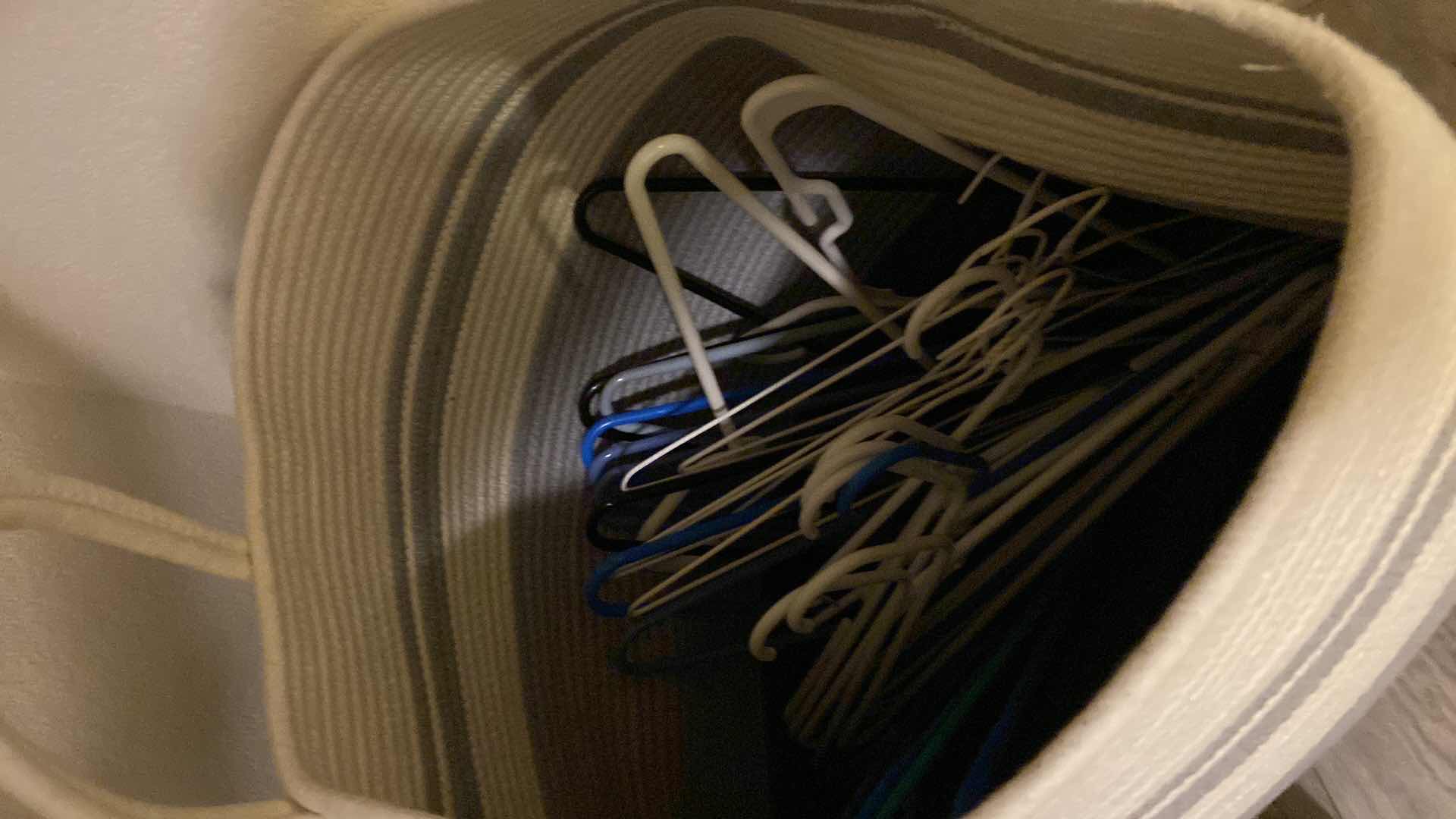 Photo 1 of 2 - 18 GALLON TIRES WITH LIDS AND LAUNDRY BASKET WITH HANGERS