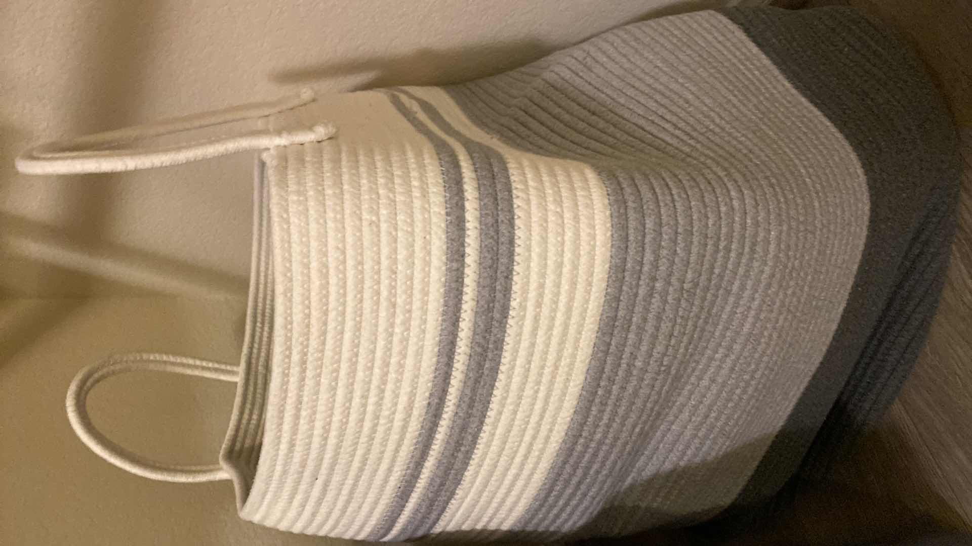 Photo 1 of 2 - 18 GALLON TIRES WITH LIDS AND LAUNDRY BASKET WITH HANGERS