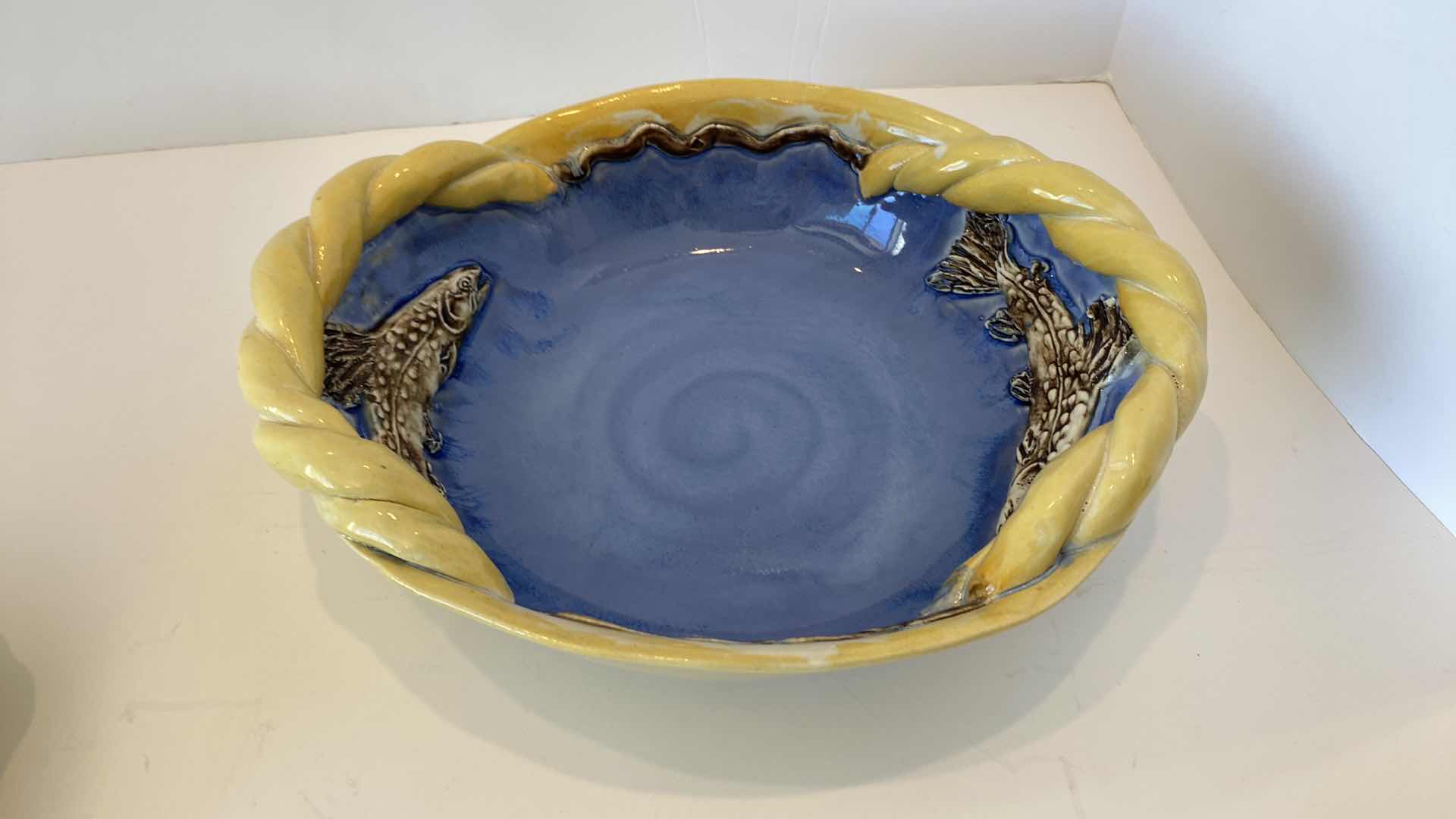 Photo 1 of HAND MADE POTTERY DECOR BLUE FISH BOWL 11”