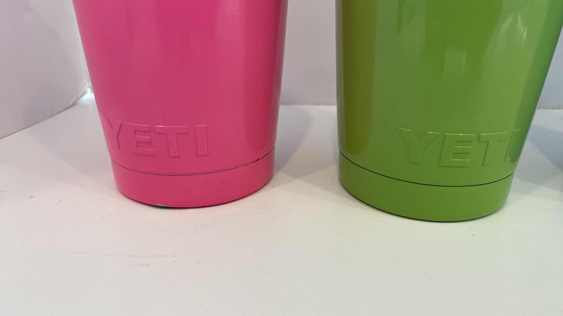 Photo 1 of CONTENTS OF KITCHEN CABINET - 4 YETI INSULATED CUPS - ONE LID MISSING