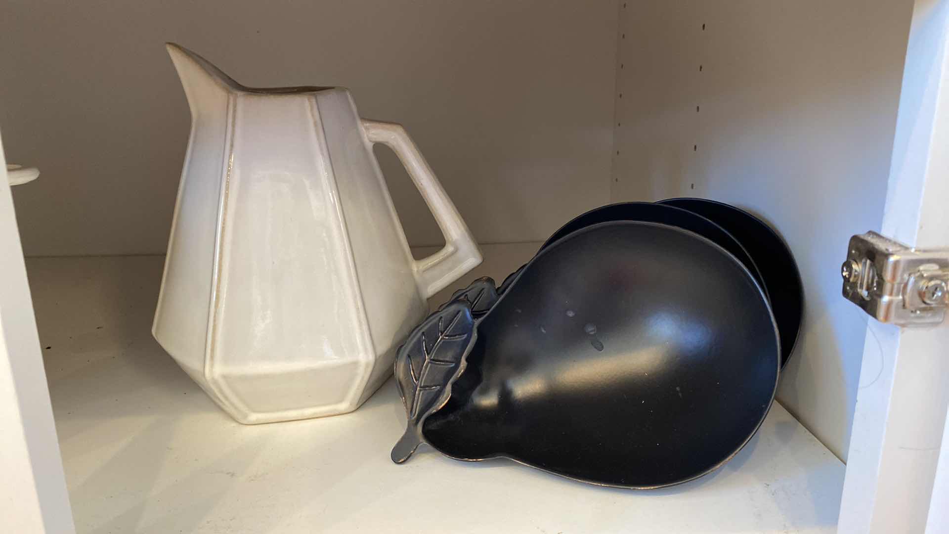 Photo 1 of CONTENTS OF KITCHEN CABINET SALAD SPINNER PLATTERS AND MORE