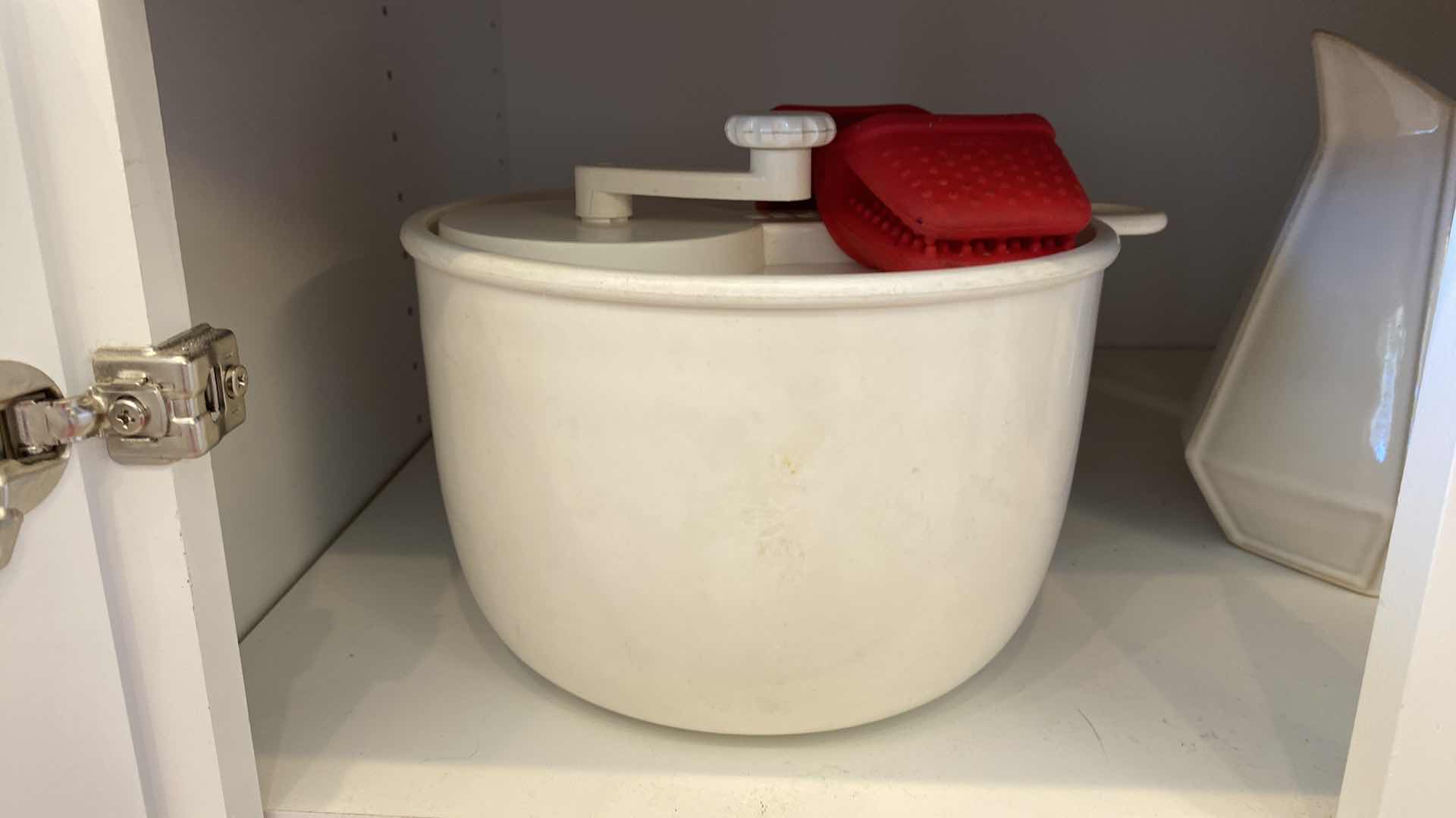 Photo 1 of CONTENTS OF KITCHEN CABINET SALAD SPINNER PLATTERS AND MORE