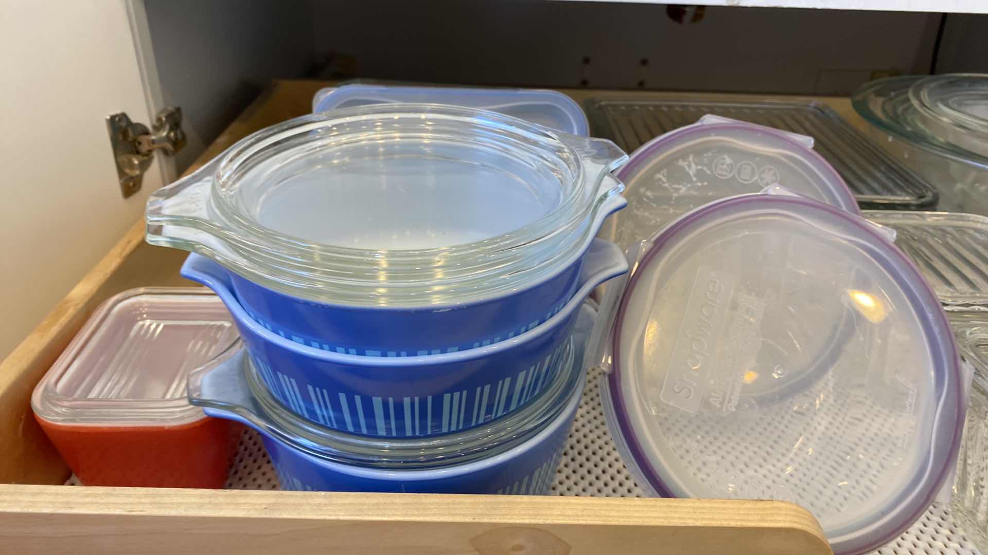 Photo 1 of CONTENTS KITCHEN CABINET SHELF GLASS BOWLS STORAGE ( PYREX AND MORE)