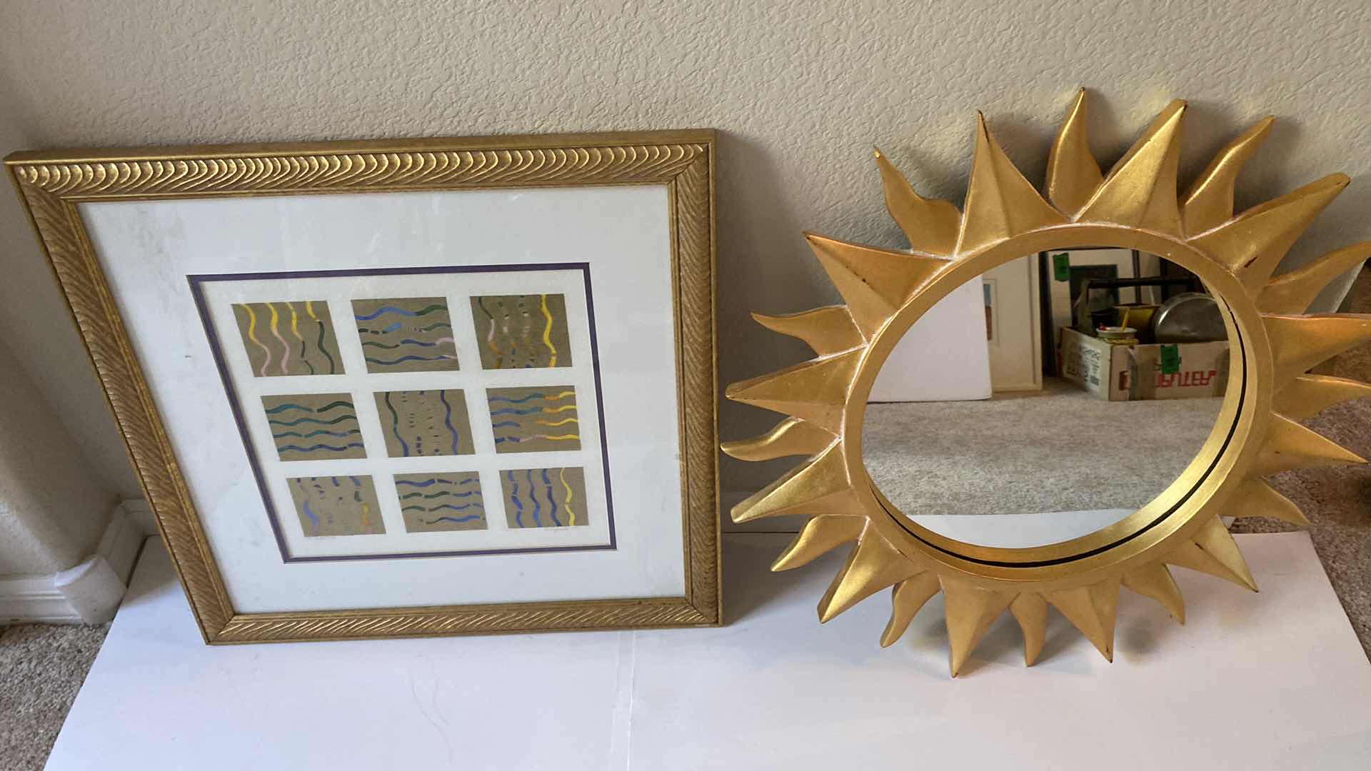Photo 1 of GOLD FRAMED SIGNED GRAPHIC ARTWORK 20 1/2” x 20 1/2” AND SUN MIRROR 22”