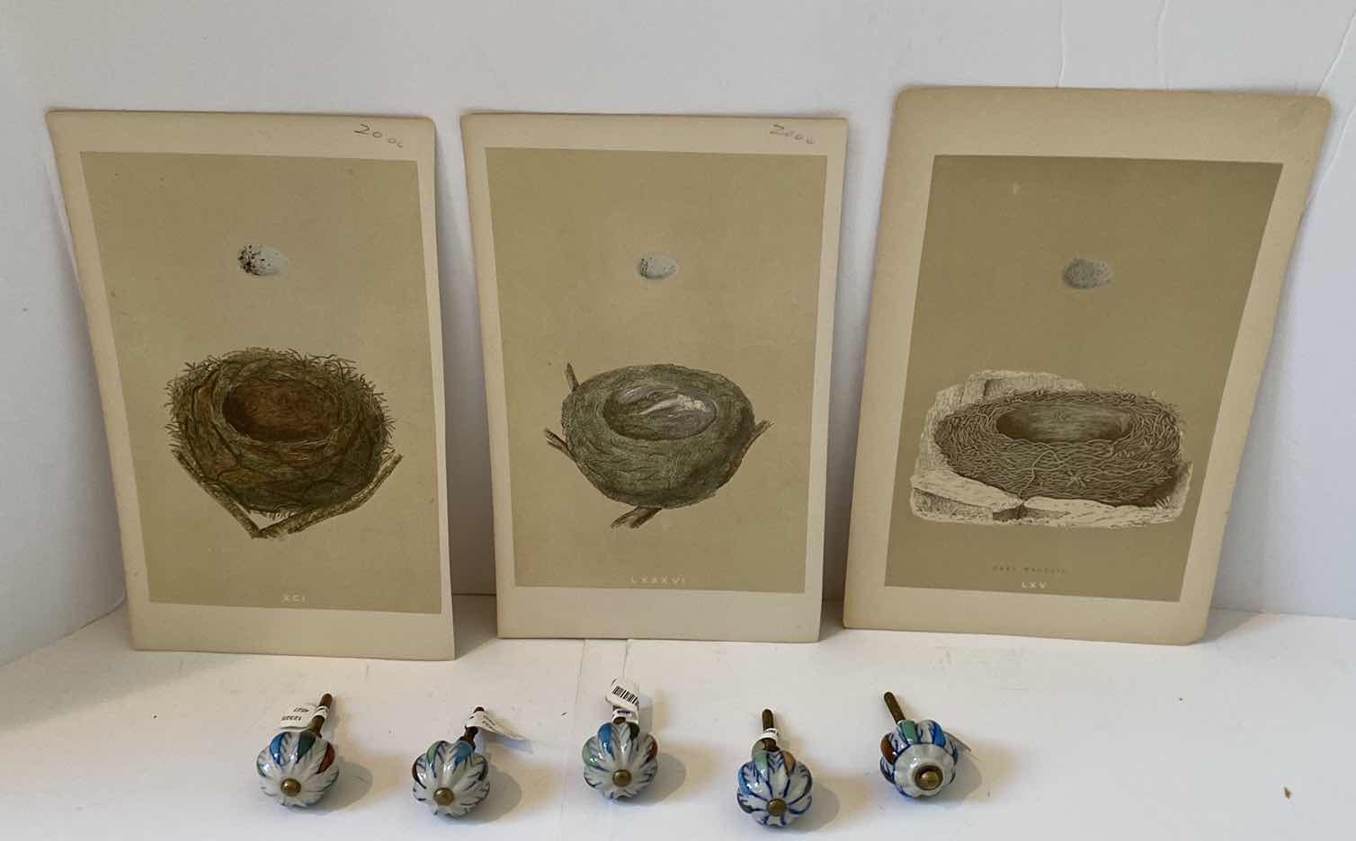 Photo 1 of CABINET PULLS AND 3 NEST PRINTS ARTWORK UNFRAMED 6 1/2” x 10”