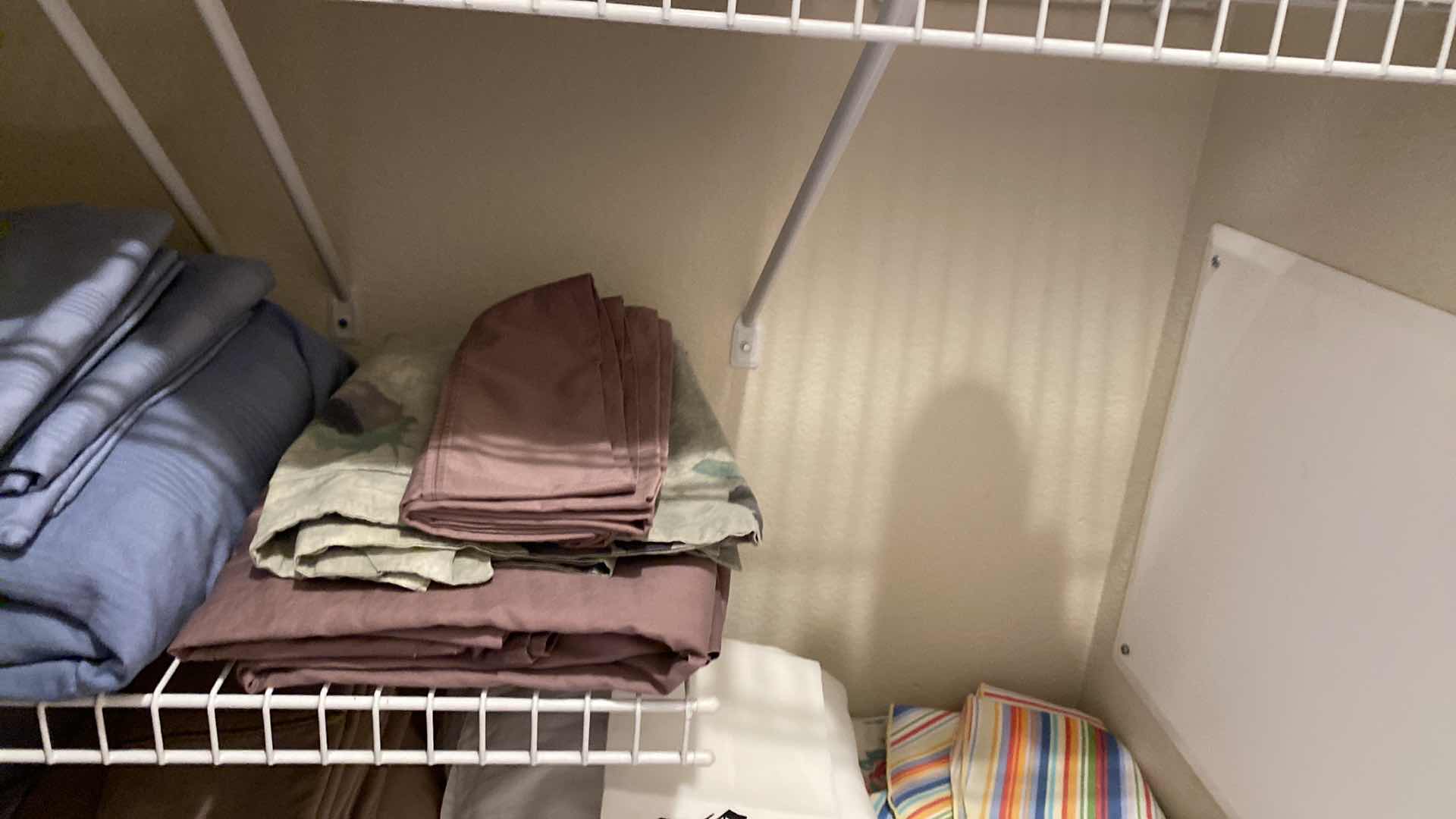 Photo 1 of CONTENTS OF LINEN CABINET