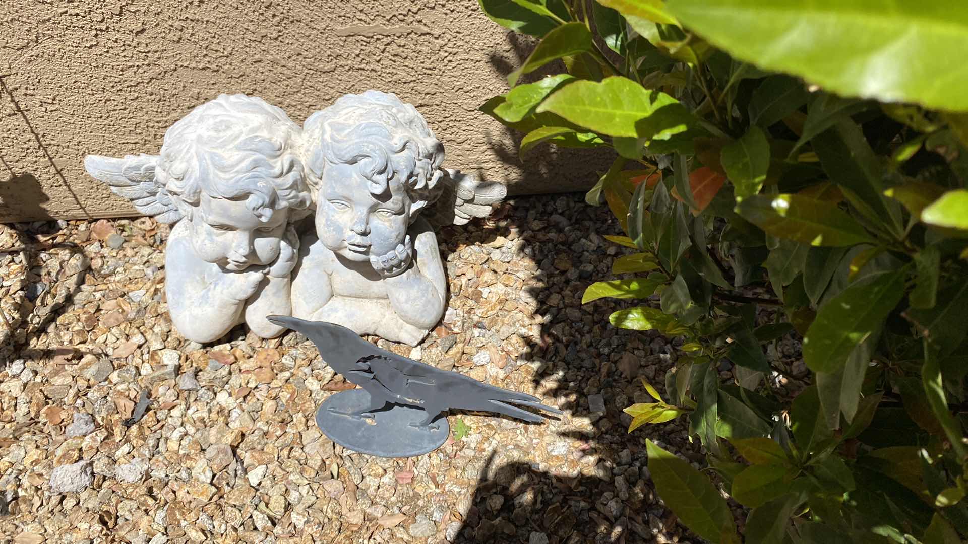 Photo 1 of ANGLE RESIN YARD ART 27” X 17” AND METAL BIRD