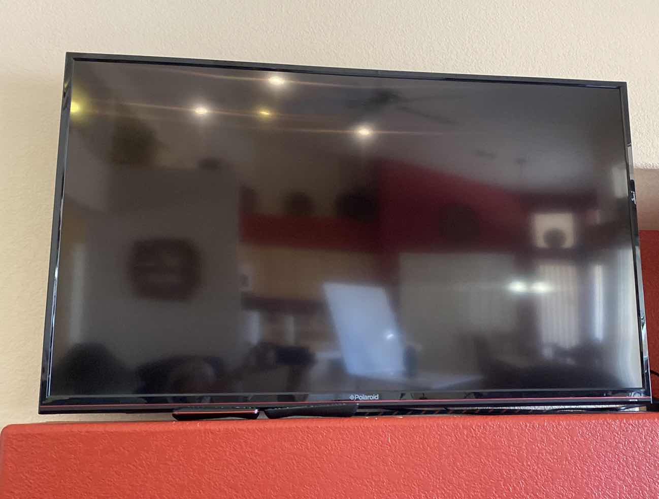 Photo 1 of 55” POLAROID TELEVISION WITH REMOTE - INCLUDED WALL  BRACKET