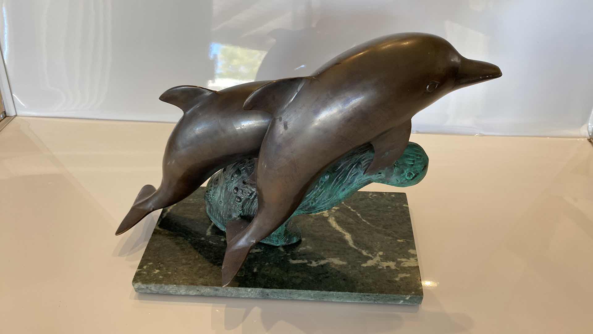 Photo 1 of METAL AND MARBLE DOLPHIN STATUE 14” x 11”