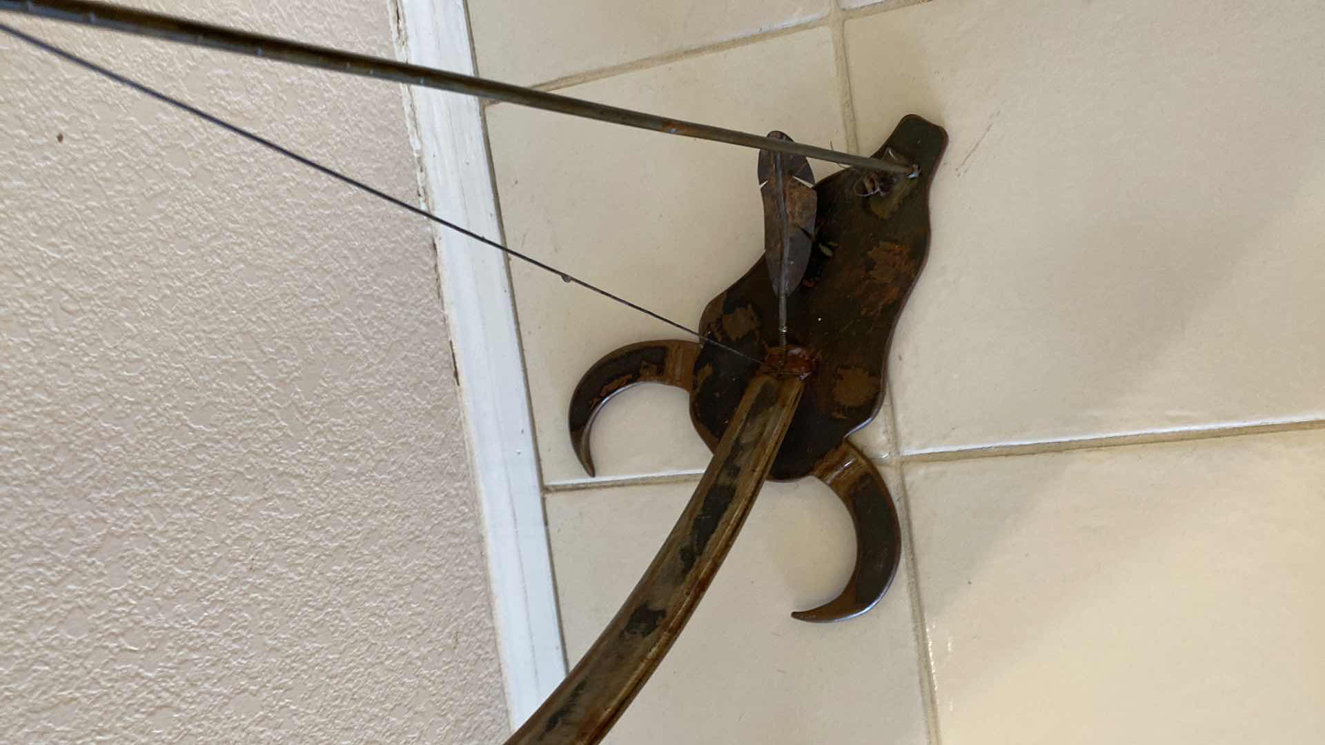 Photo 1 of HANDCRAFTED UNIQUE METAL BOW AND ARROW WITH STEER HEAD BASE H 38”