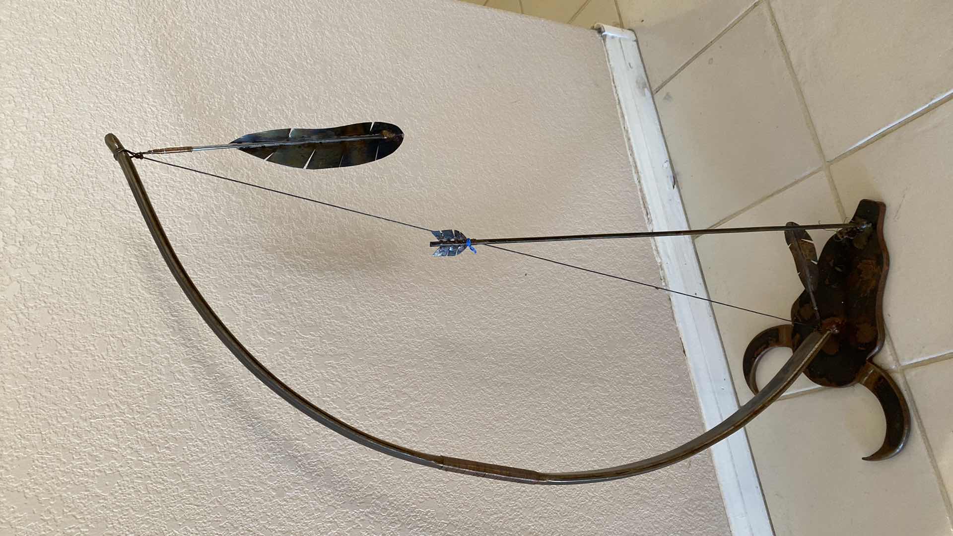 Photo 1 of HANDCRAFTED UNIQUE METAL BOW AND ARROW WITH STEER HEAD BASE H 38”