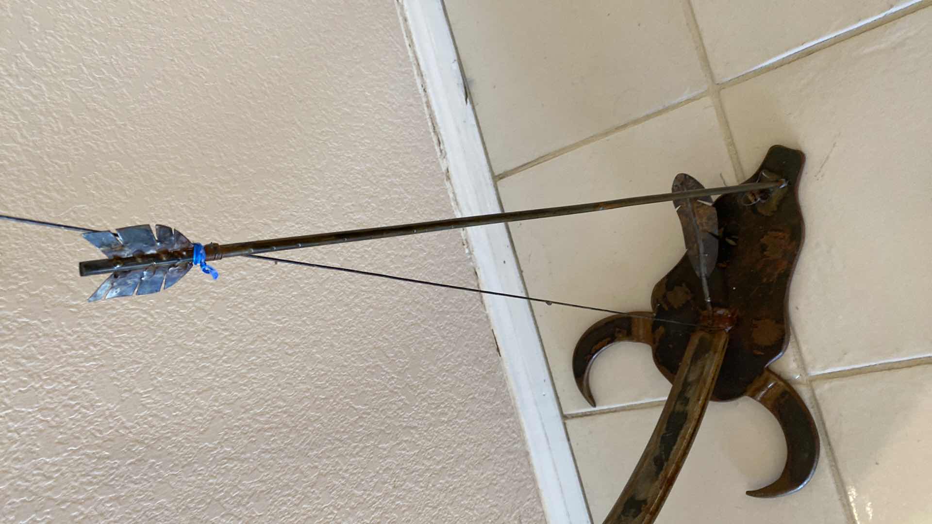 Photo 1 of HANDCRAFTED UNIQUE METAL BOW AND ARROW WITH STEER HEAD BASE H 38”