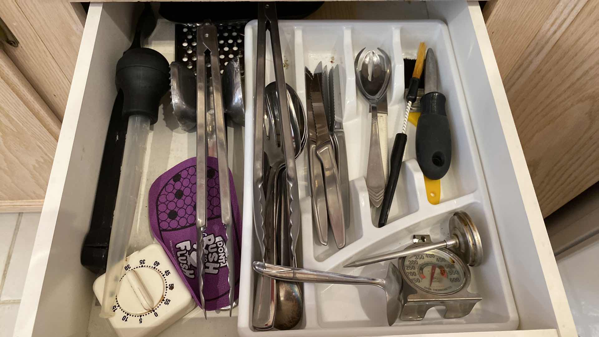 Photo 1 of CONTENTS OF THREE KITCHEN DRAWERS COOKING UTENSILS AND LINENS