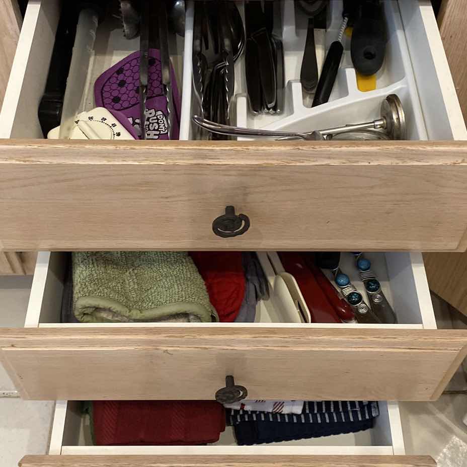 Photo 1 of CONTENTS OF THREE KITCHEN DRAWERS COOKING UTENSILS AND LINENS