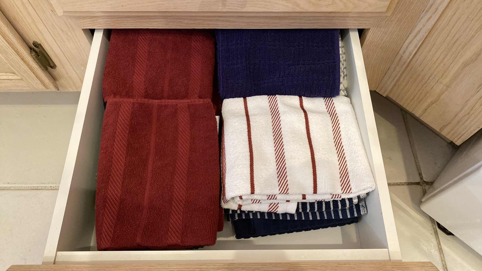 Photo 1 of CONTENTS OF THREE KITCHEN DRAWERS COOKING UTENSILS AND LINENS