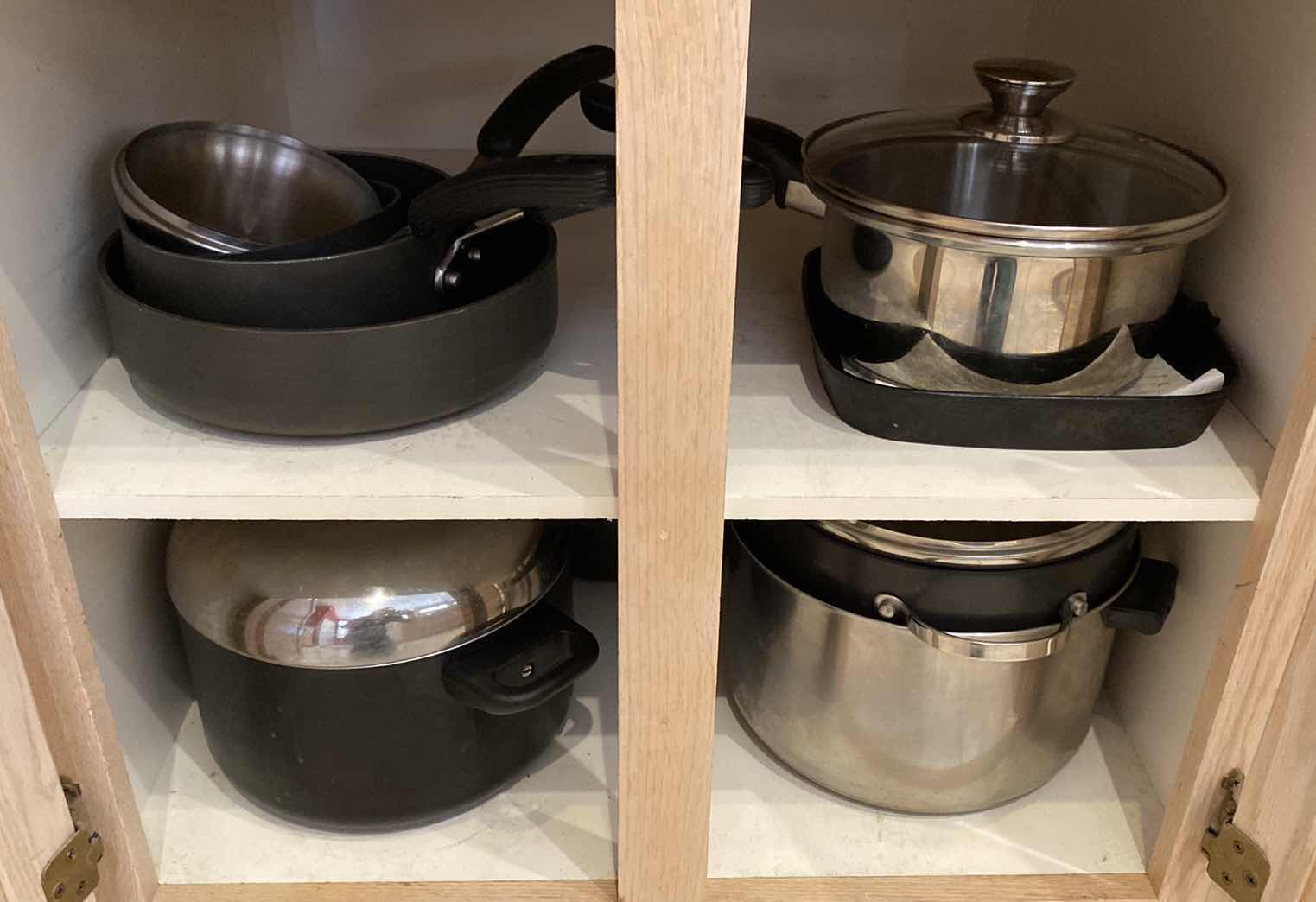 Photo 1 of CONTENTS OF KITCHEN CABINET POTS AND PANS