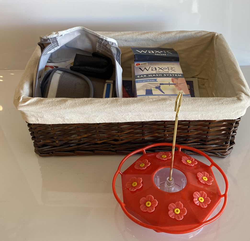 Photo 1 of BASKET WITH BLOOD PRESSURE MONITOR EAR WASH SYSTEM AND MORE