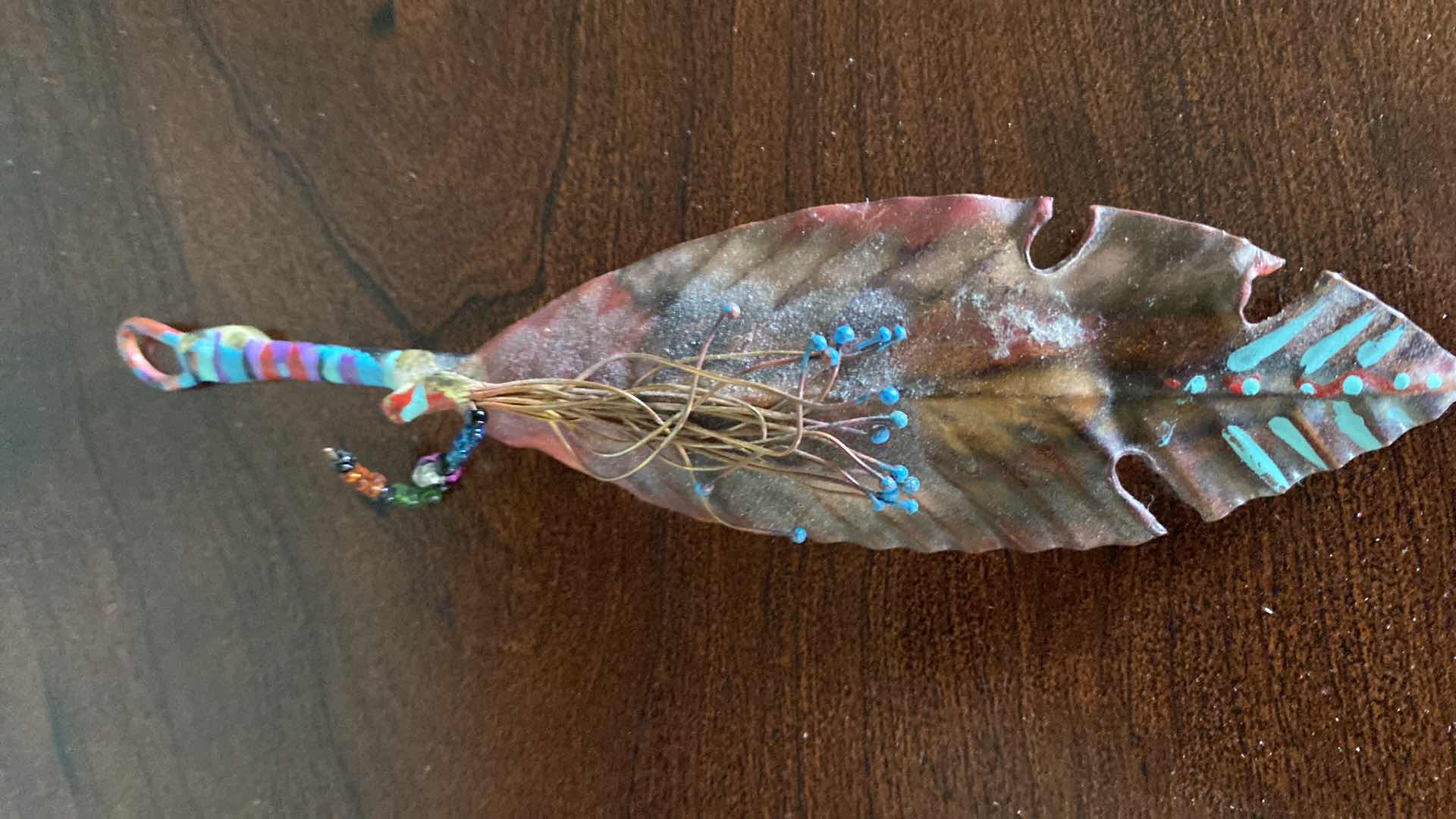 Photo 1 of METAL FEATHER PIN AND PULSAR WATCH