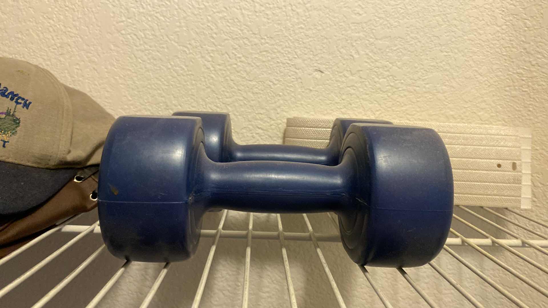 Photo 3 of FREE WEIGHTS AND BASEBALL CAPS AND BELTS BELTS PRIMARY CLOSET