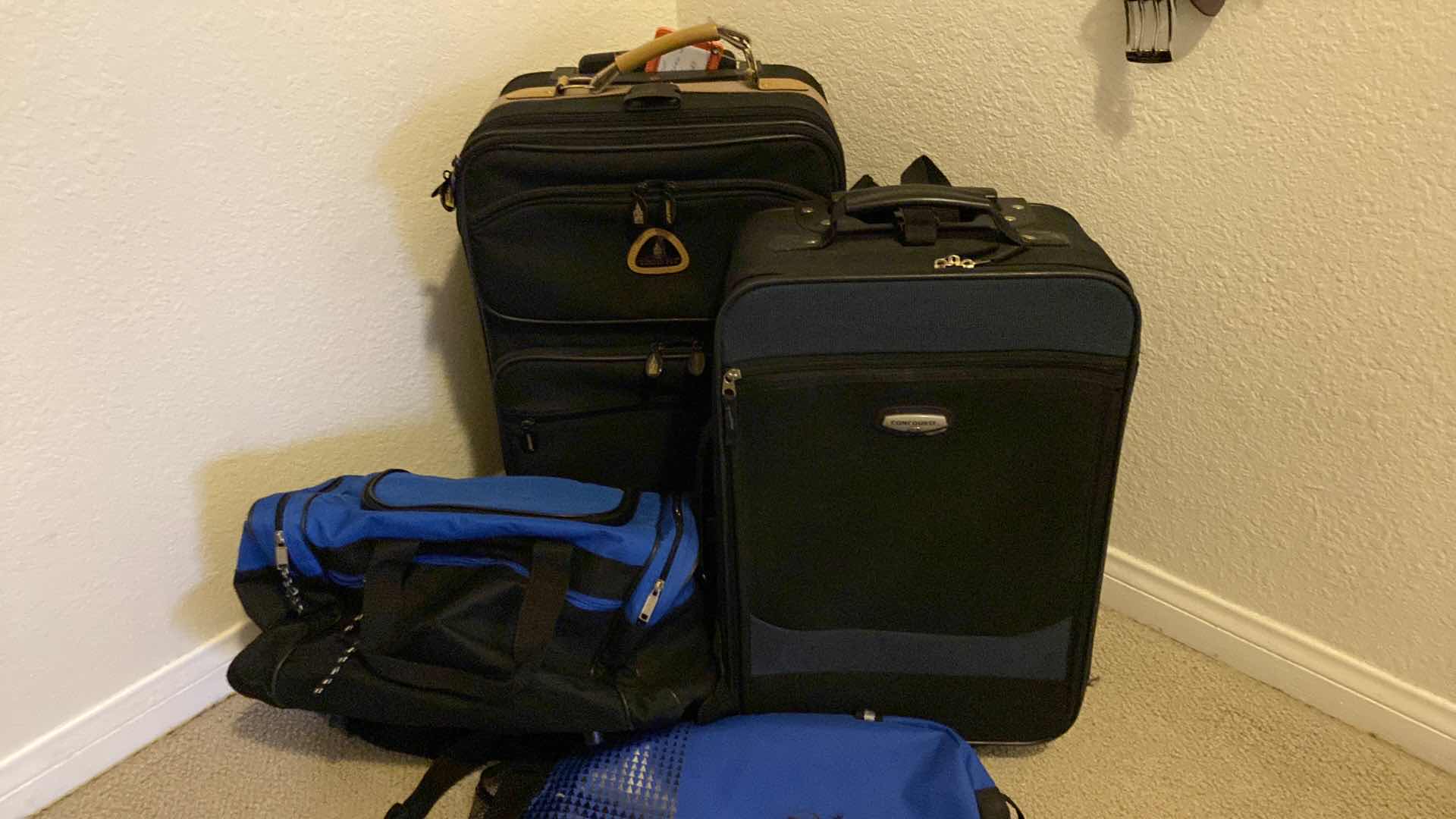 Photo 1 of 2 CARRY ON sUITCASES  AND 2 BAGS