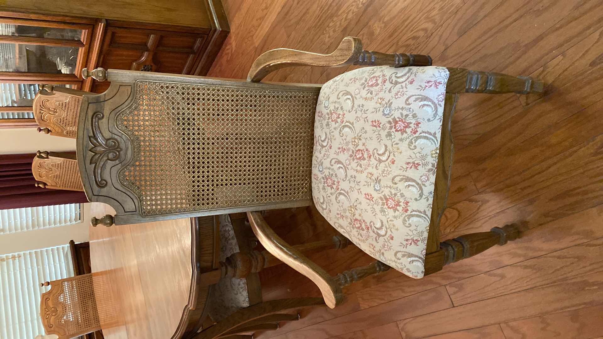 Photo 1 of OAK DINING TABLE WITH 6 CANE BACK CHAIRS MEASUREMENT INCLUDES 18” LEAF 80” x 42” H 30” INCLUDES TABLE PADS