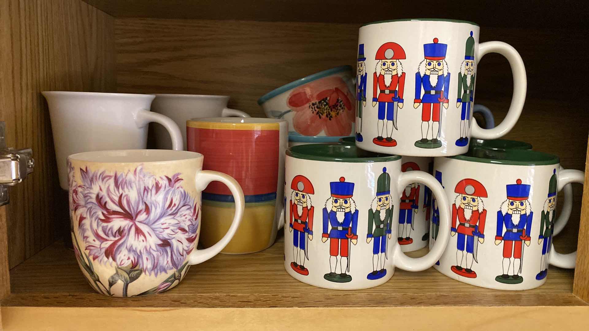 Photo 1 of CONTENTS OF CABINET COFFEE CUPS