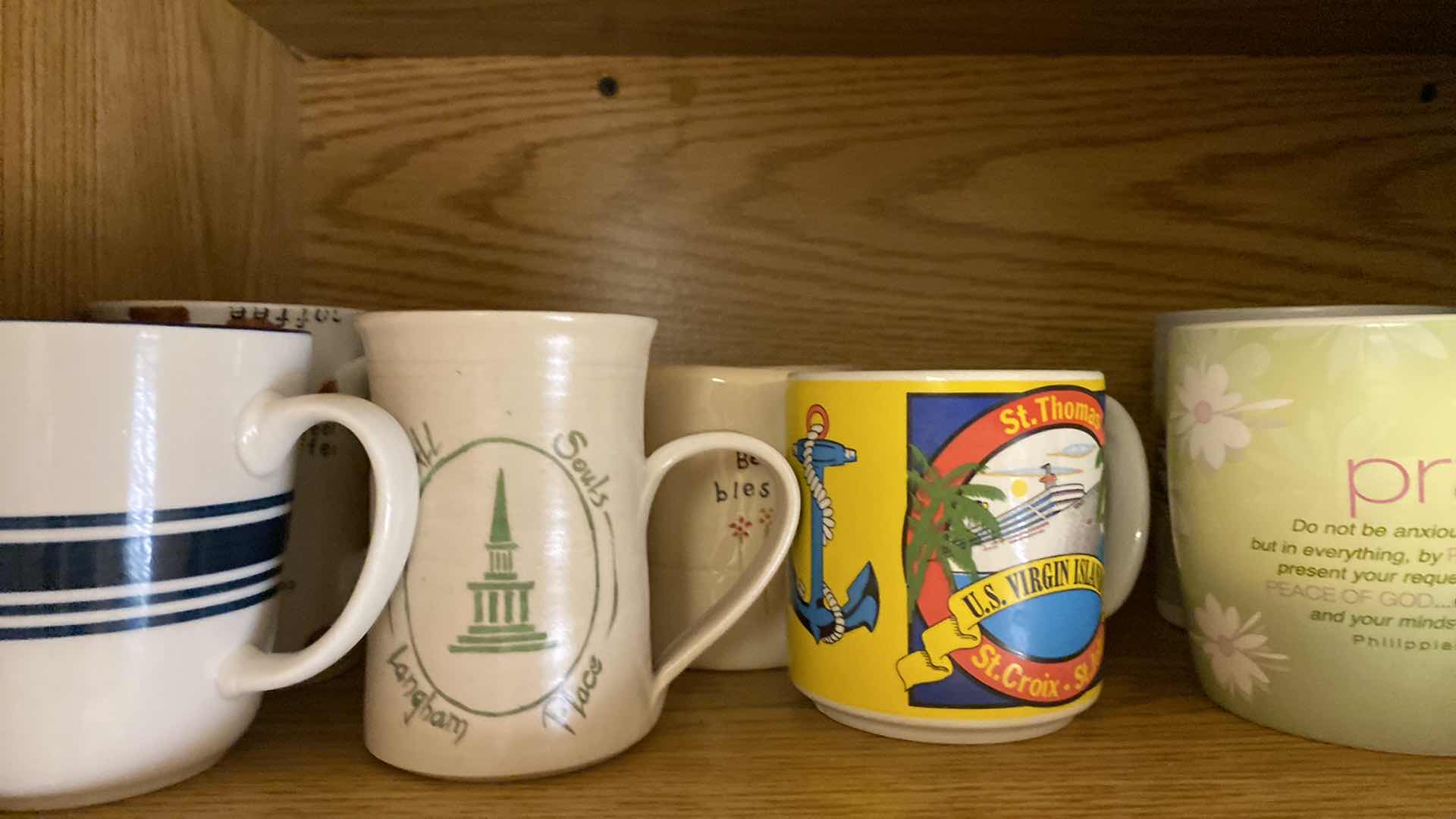 Photo 1 of CONTENTS OF CABINET COFFEE CUPS