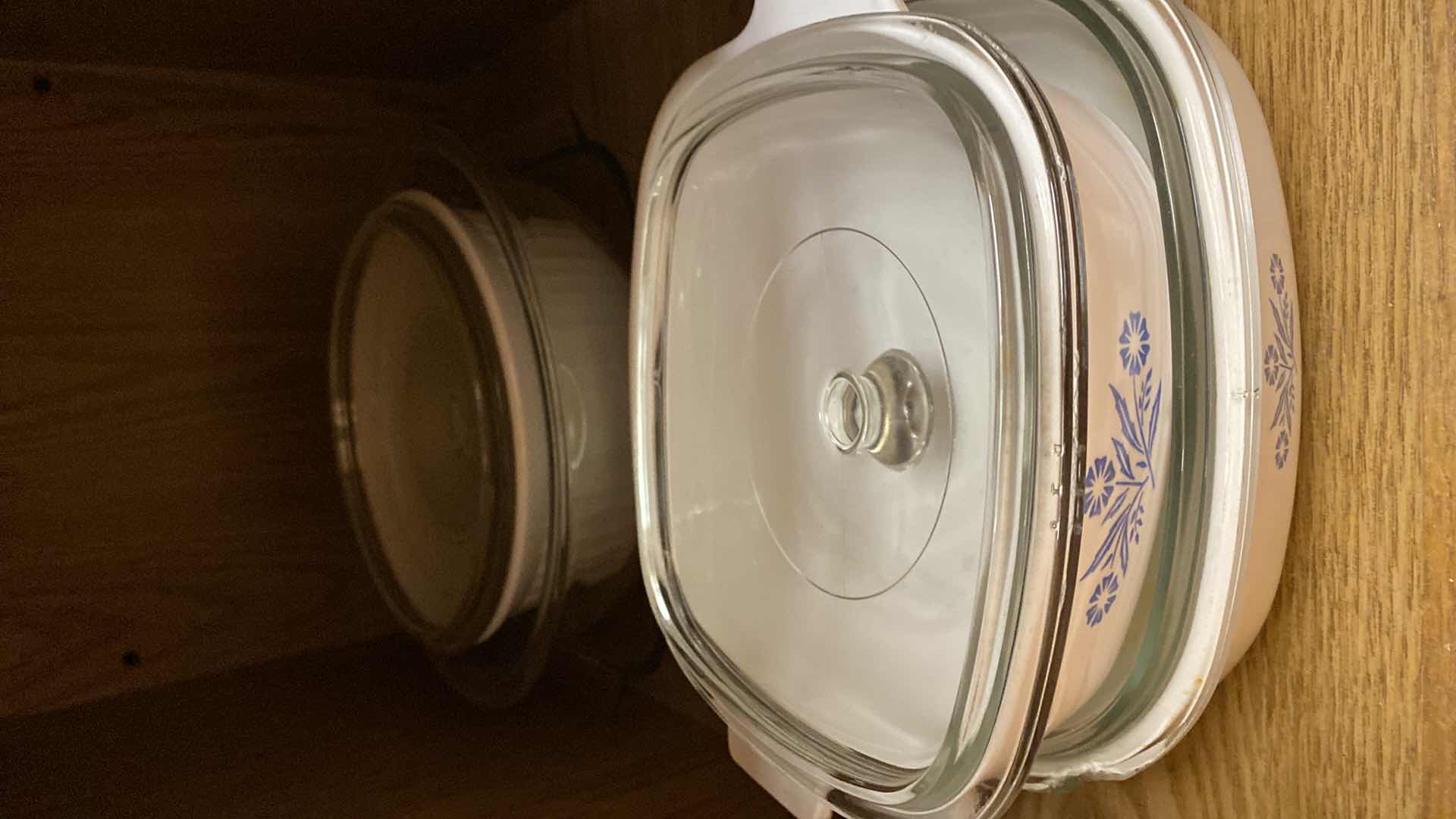 Photo 1 of CONTENTS OF KITCHEN CABINET PYREX AND CORNING WARE